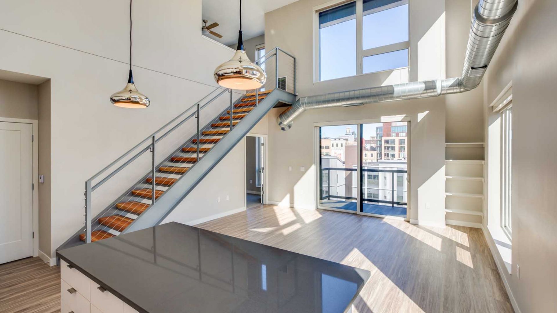 East End apartments spacious and sunny apartment kitchen and living space with bold furnishings